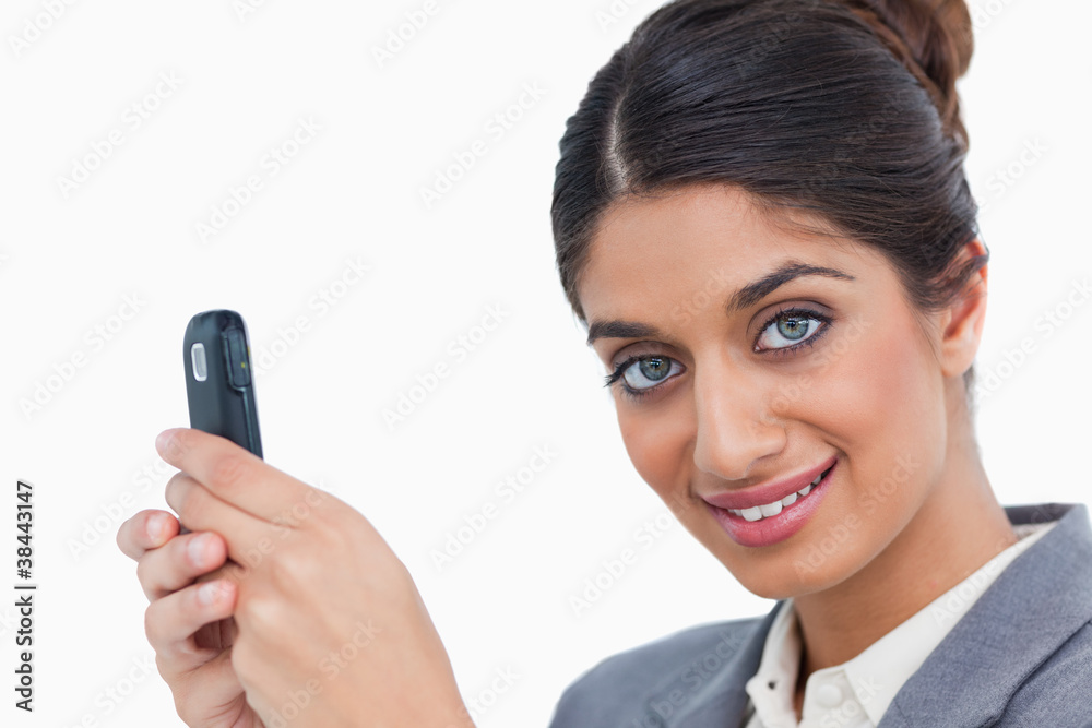 Close up of female entrepreneur with her mobile phone Close up of female entrepreneur with her mobile phone