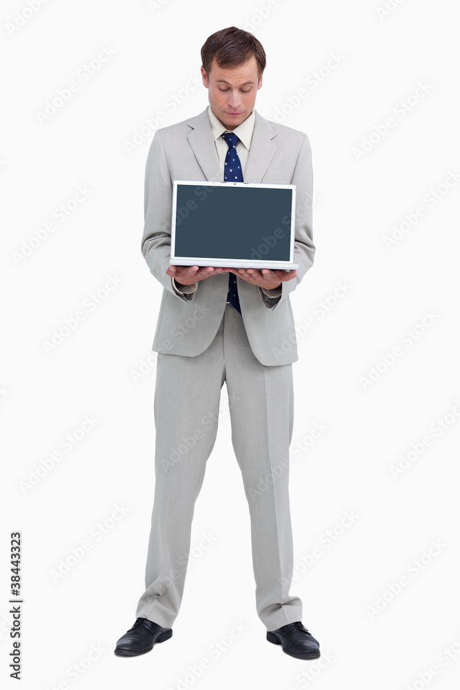 Businessman looking at the laptop he is presenting