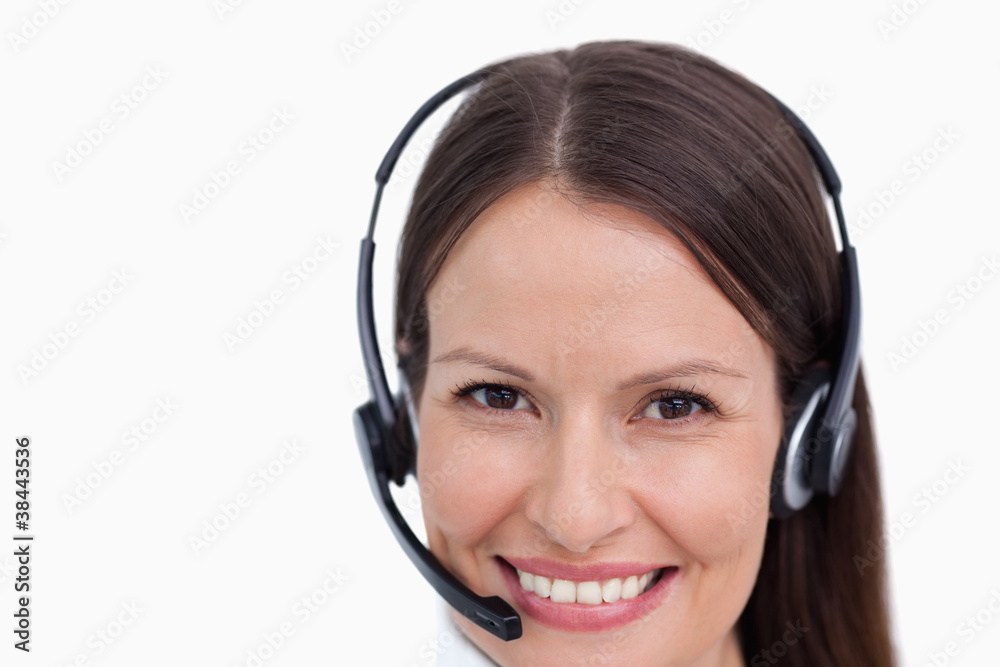 Close up of smiling female call center agent Close up of smiling female call center agent