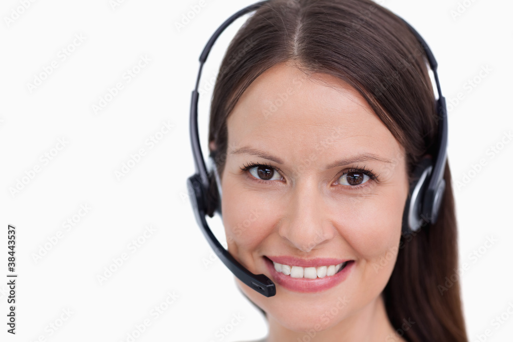 Close up of smiling female call center employee Close up of smiling female call center employee