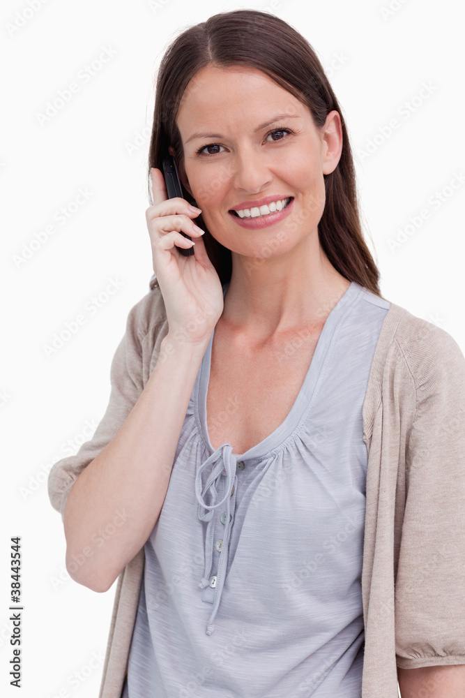 Close up of smiling woman on her phone Close up of smiling woman on her phone