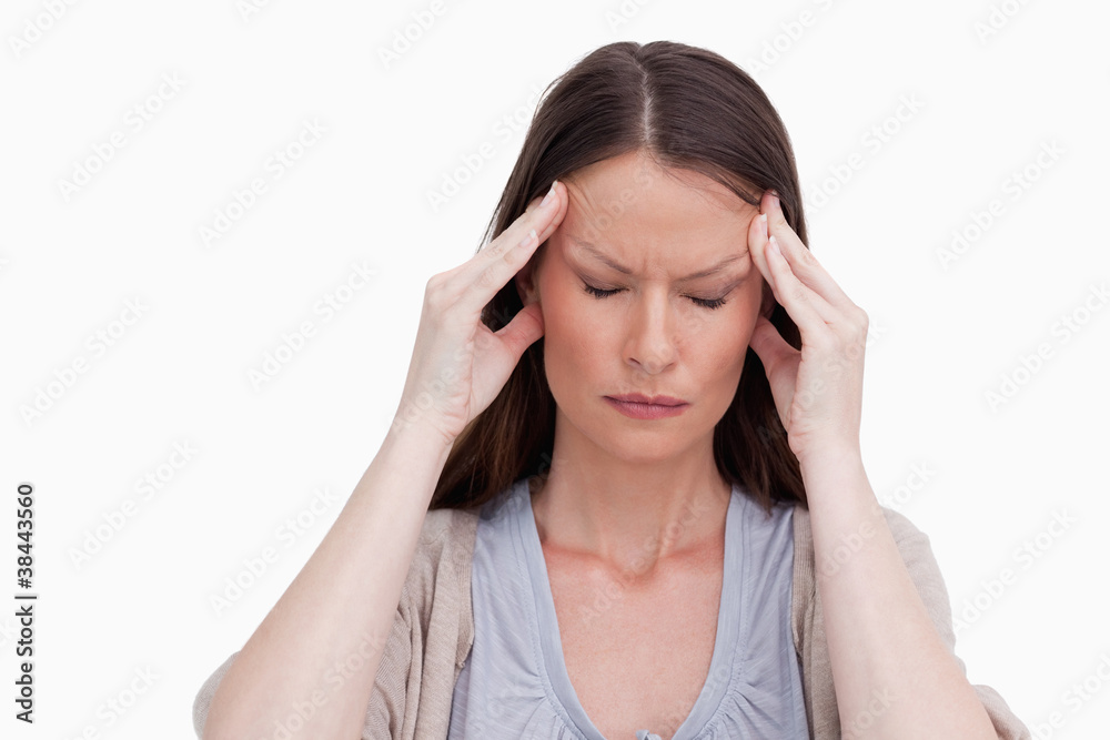 Close up of woman experiencing a headache Close up of woman experiencing a headache