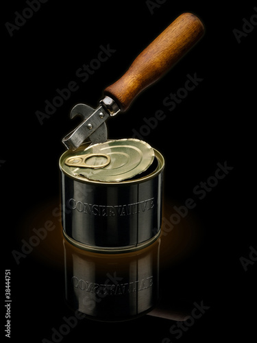 Can opener and tin box. photo