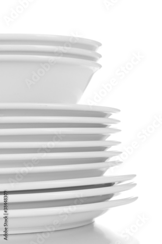 empty bowls and plates isolated on white