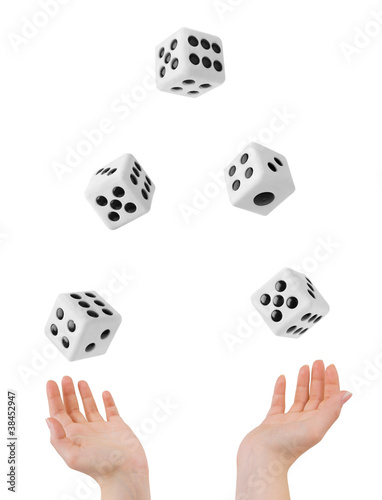 Hands throwing dices