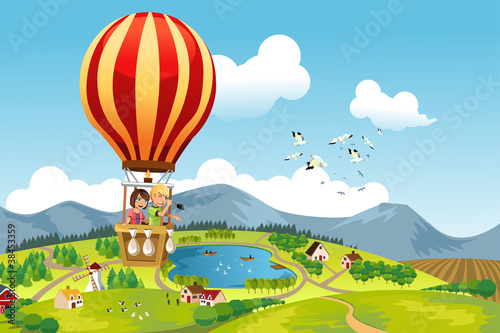 Obraz dzieci lecące balonem nad górskim krajobrazem
