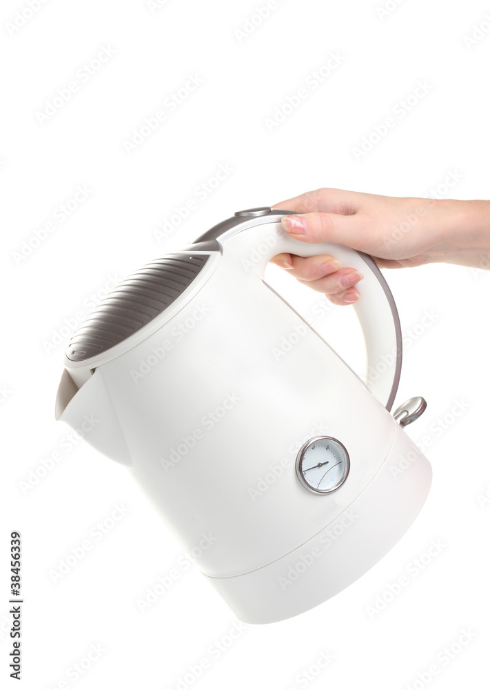 Womens hand and white electric kettle isolated on white Womens hand and white electric kettle isolated on white