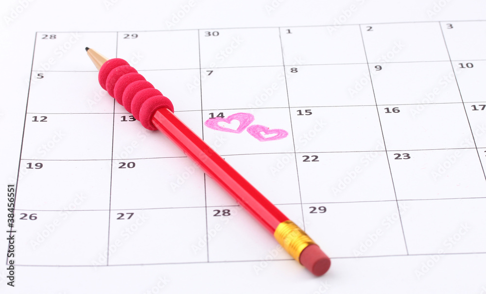 Calendar page with hearts and pencil on St.Valentines Day Calendar page with hearts and pencil on St.Valentines Day