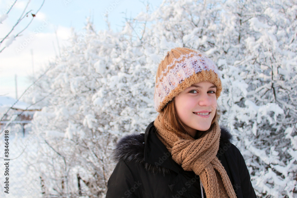 The girl on the background of winter nature