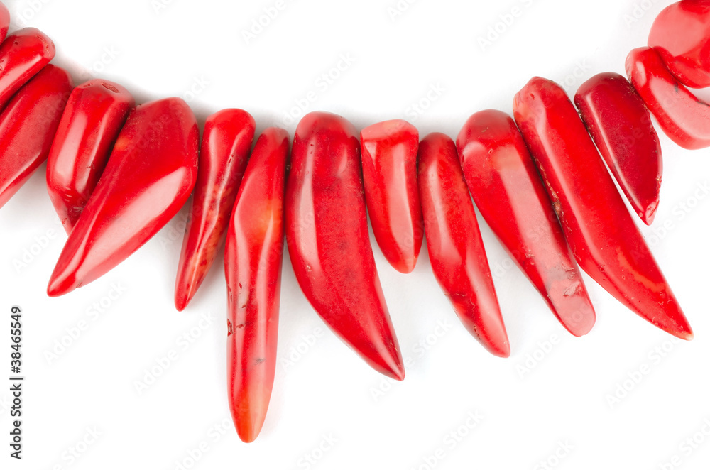 Red natural coral necklace on white background Red natural coral necklace on white background