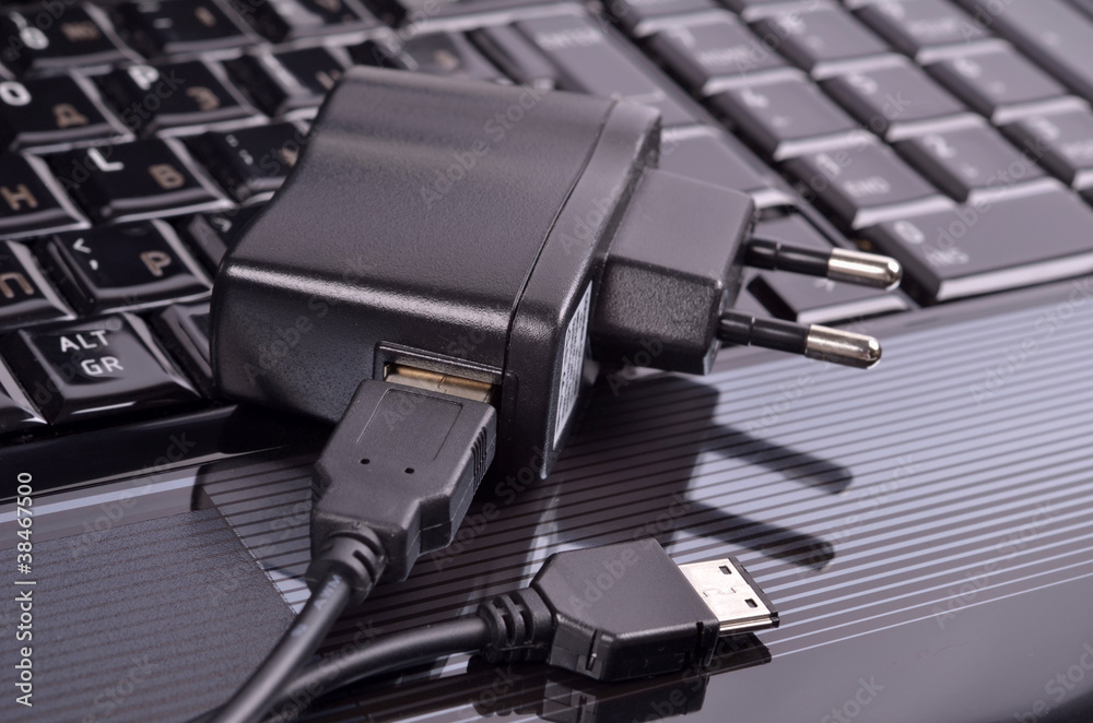 Device for charging via USB and laptop,close-up Device for charging via USB and laptop,close-up