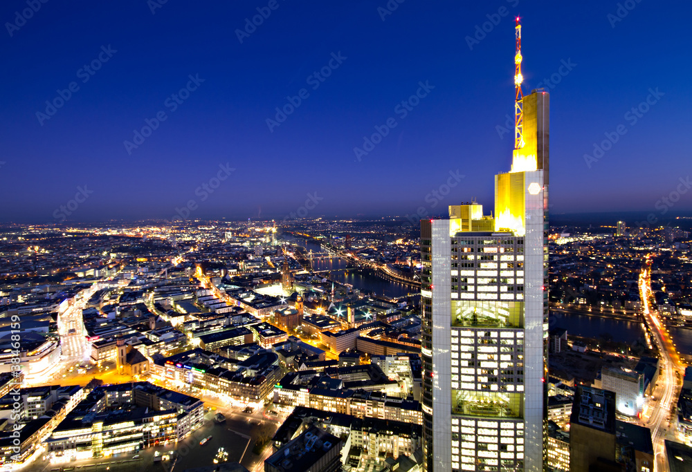 Naklejka premium Illuminated cityscape of Frankfurt