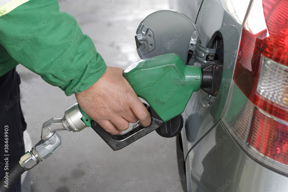 Refueling Automobile With Gasoline Pump Nozzle Refueling Automobile With Gasoline Pump Nozzle
