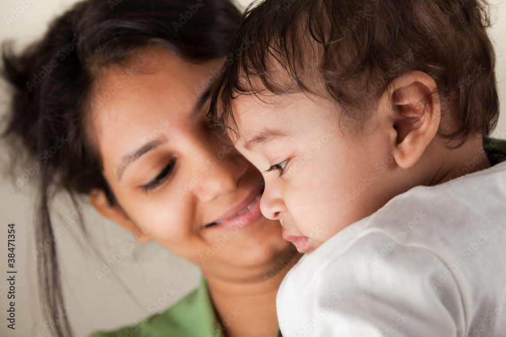 Indian mother and baby smiling Indian mother and baby smiling