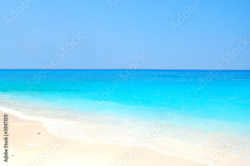 white beach and blue sea
