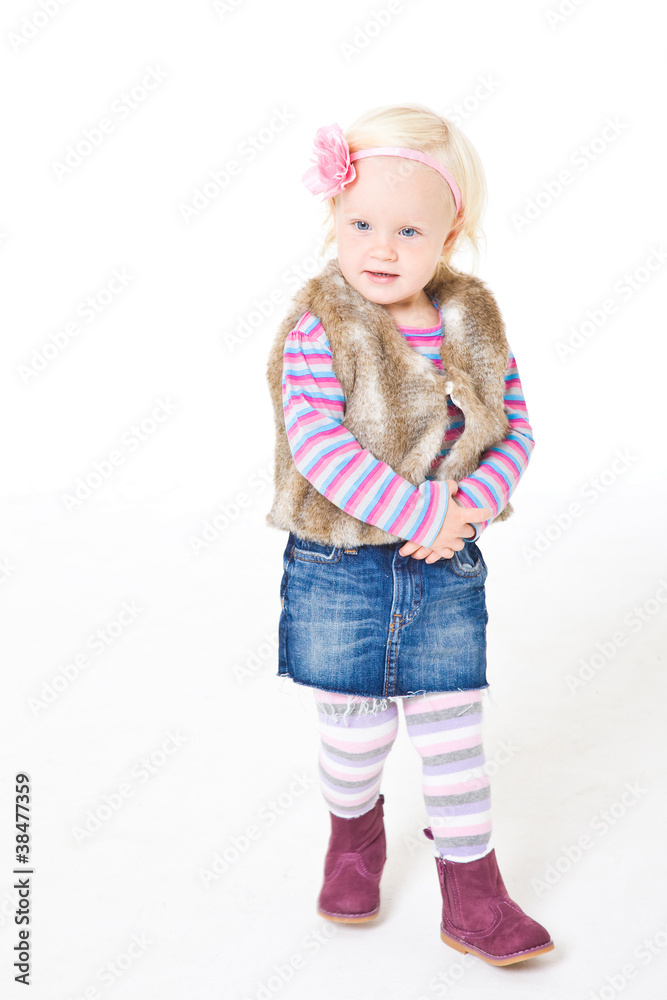 portrait of blonde girl in a fur vest portrait of blonde girl in a fur vest