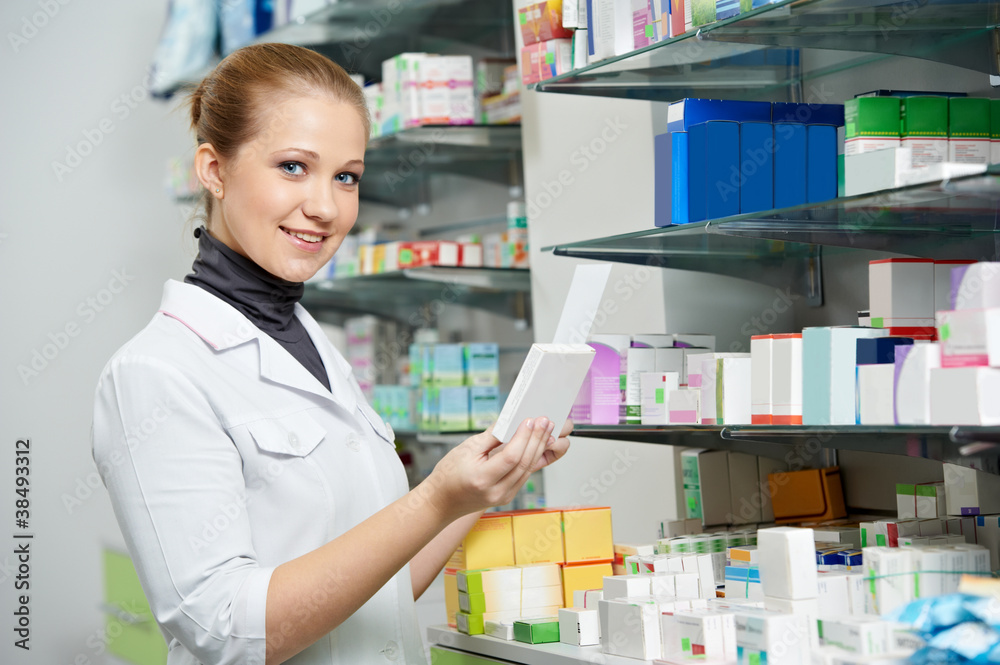 Pharmacy chemist women in drugstore