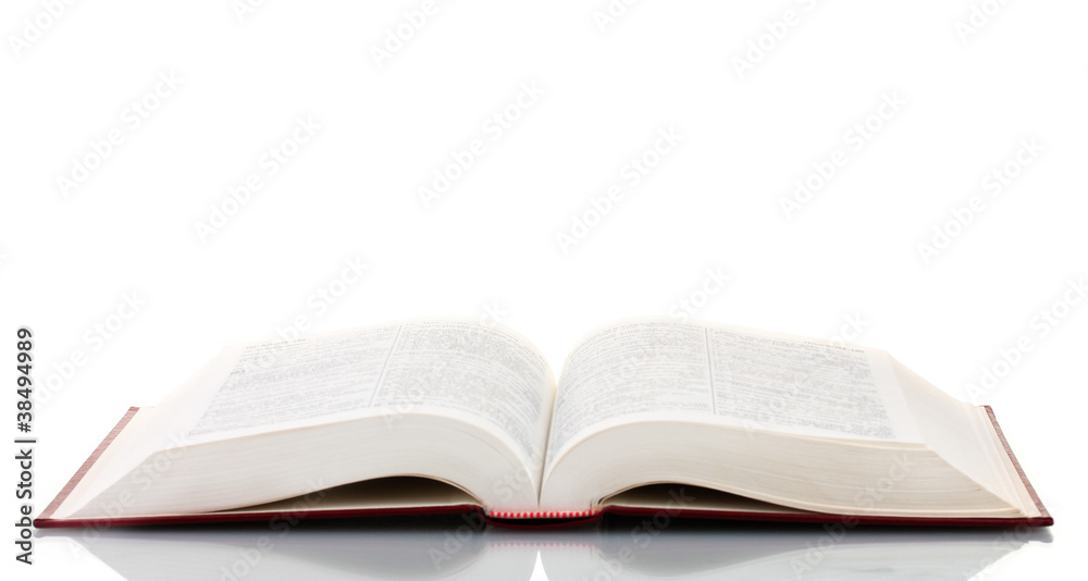 Open book on reflective surface isolated on white Open book on reflective surface isolated on white