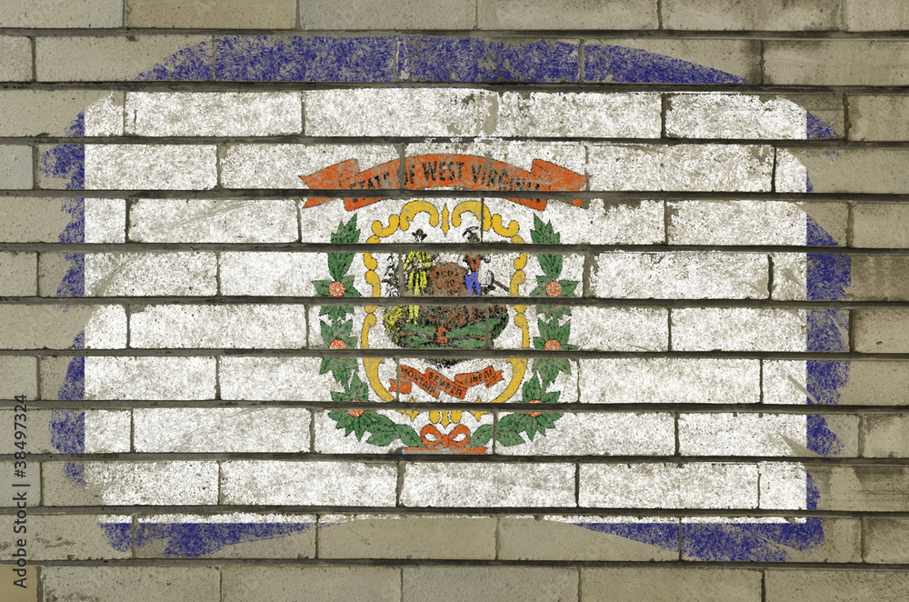 flag of US state of west virginia on brick wall painted with cha