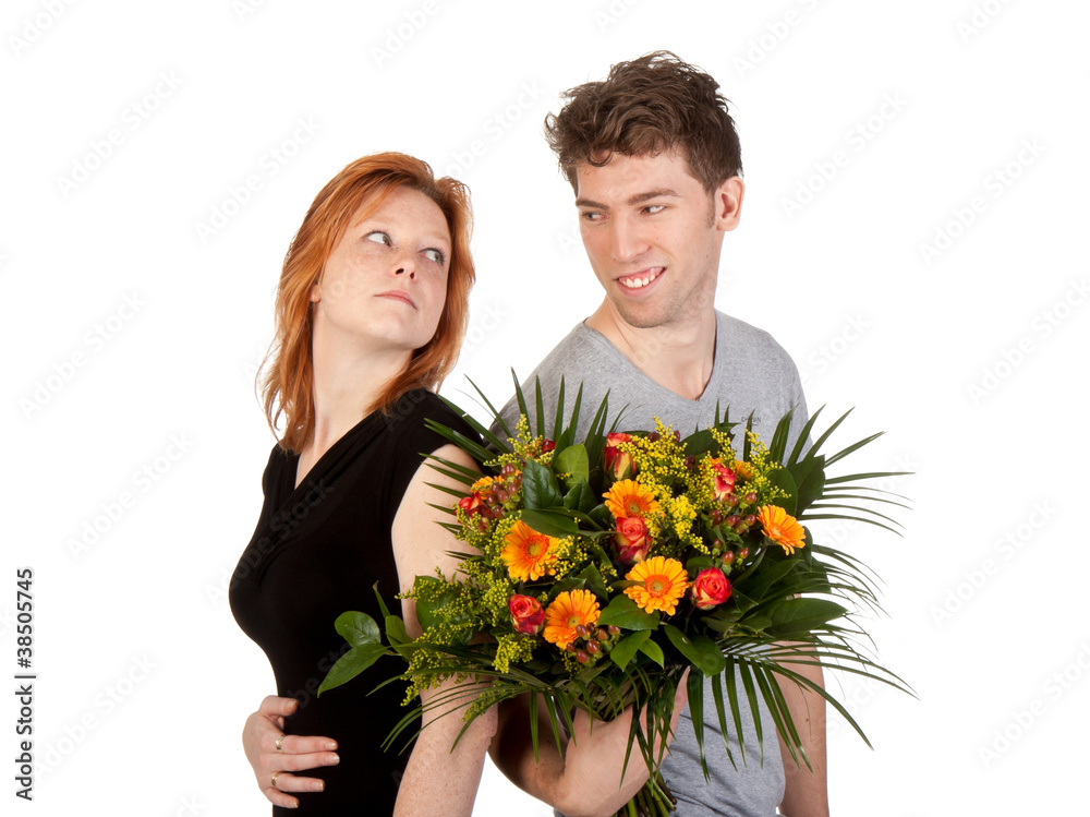 Man and woman in love with a beautiful bunch of flowers Man and woman in love with a beautiful bunch of flowers