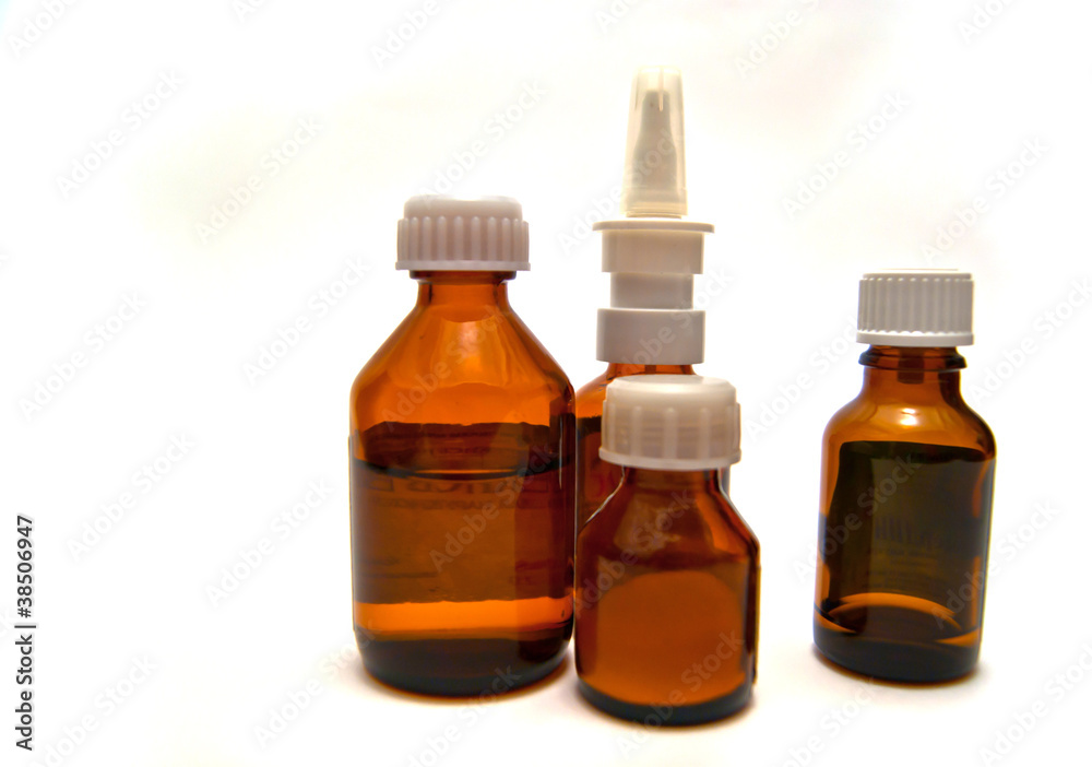 Four bottles of different medicine Four bottles of different medicine
