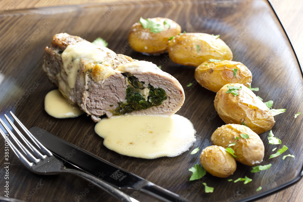 baked pork tenderloin filled with spinach and goat cheese