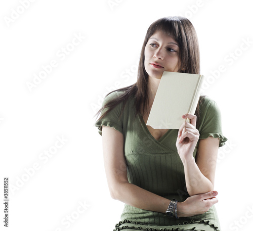 Thinking woman holding a book, cover is blank
