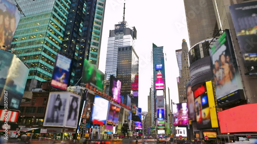 Times Square in New York City time lapse with blurred trademarks photo