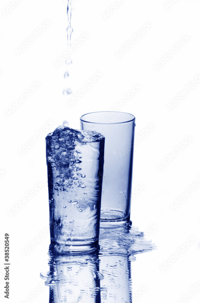 Two glasses and drops of water Two glasses and drops of water