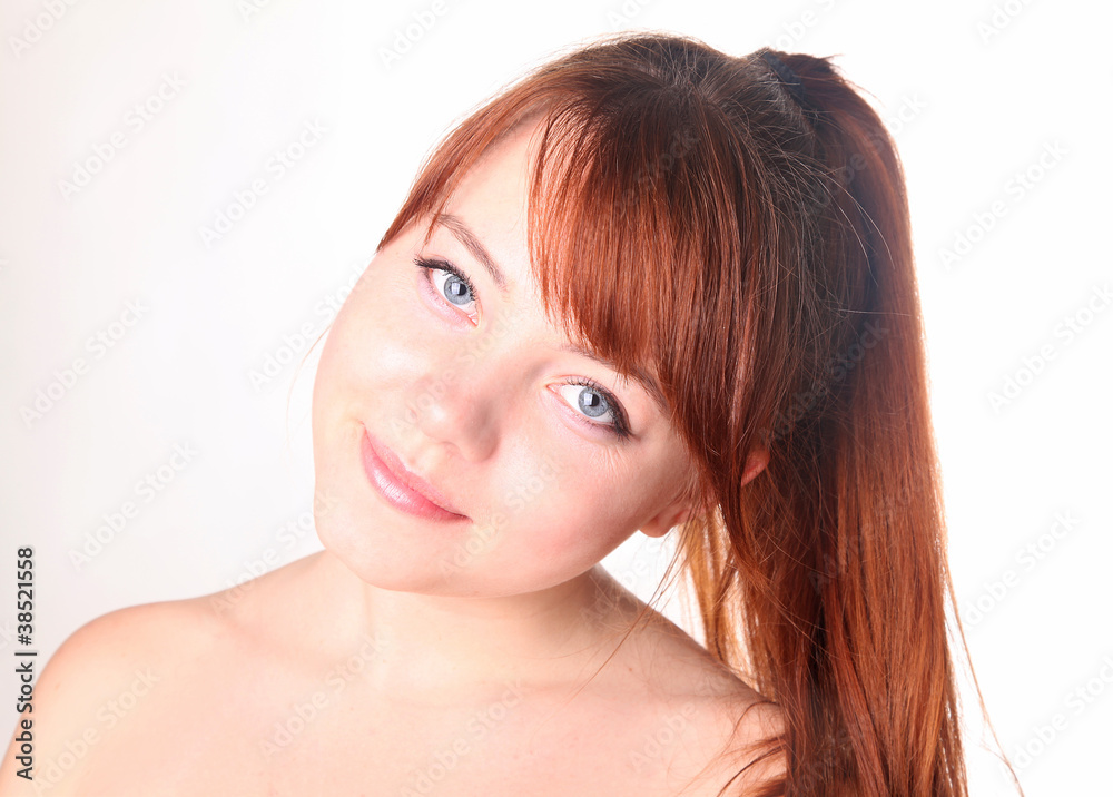 Sensual young smiling woman with beautiful long red hair Sensual young smiling woman with beautiful long red hair