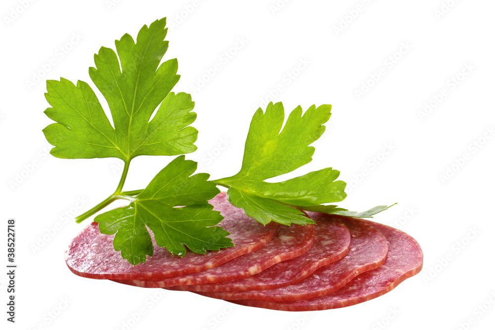 Fresh salami with a parsley branch Fresh salami with a parsley branch