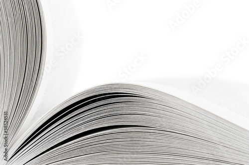 Macro of opened book on white background