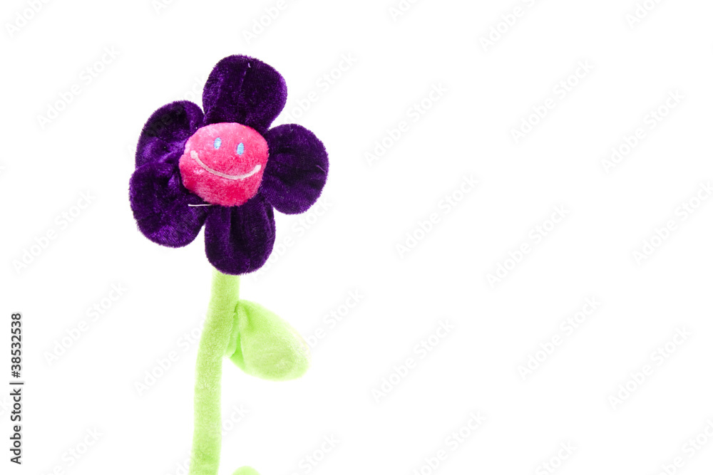 Stoffblume mit Gesicht Stock-Foto | Adobe Stock