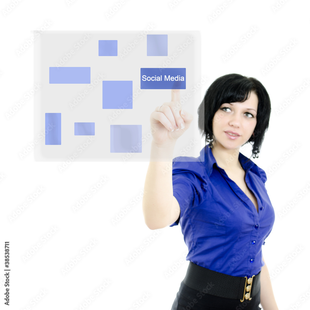 Attractive executive woman pushing on a touch screen Attractive executive woman pushing on a touch screen