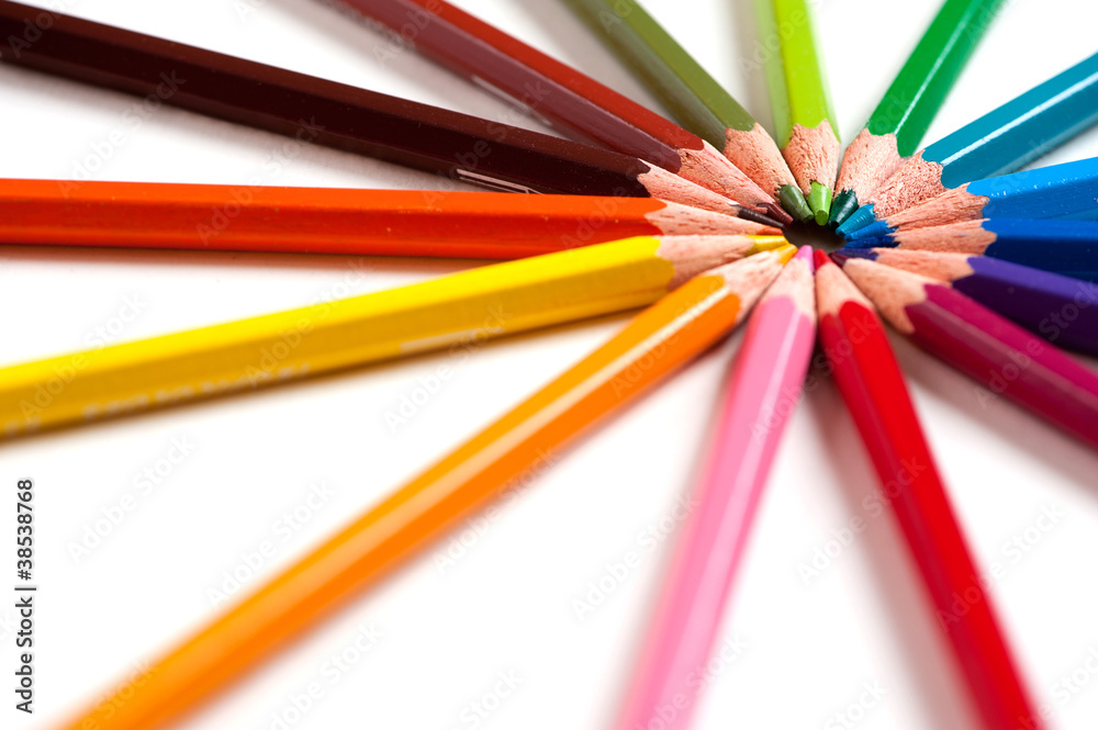 circle made of color pencils on white background circle made of color pencils on white background