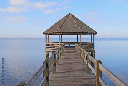 Gazebo and dock over calm sound waters