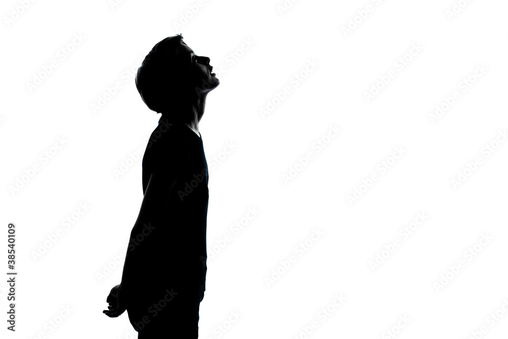 one young teenager boy or girl looking up silhouette