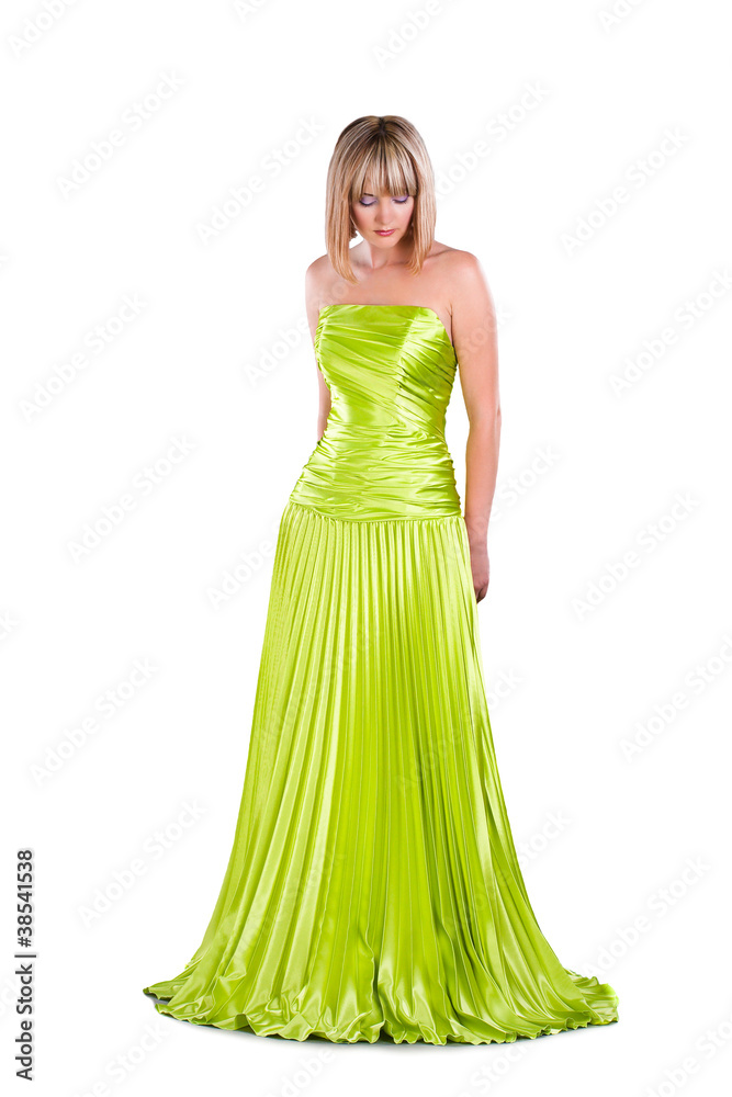 pretty young woman wearing green gown isolated on white