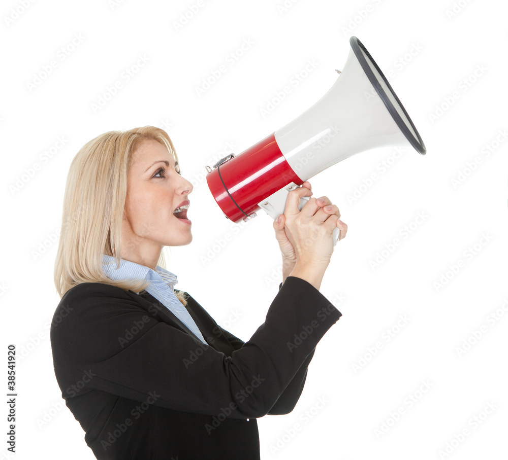 Female executive yelling through a megaphone Female executive yelling through a megaphone