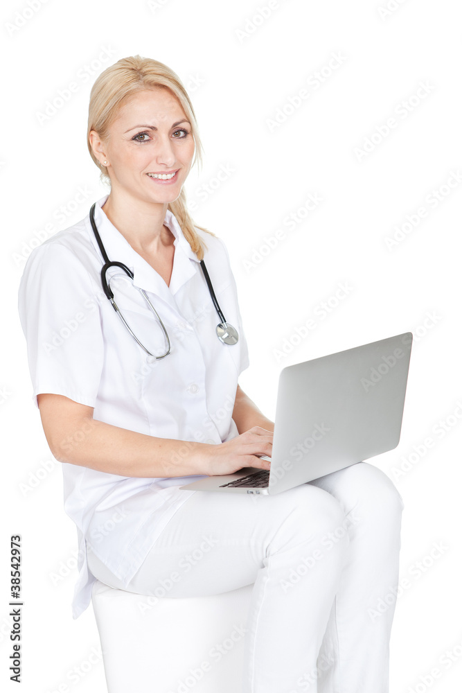 Medical doctor working on laptop Medical doctor working on laptop