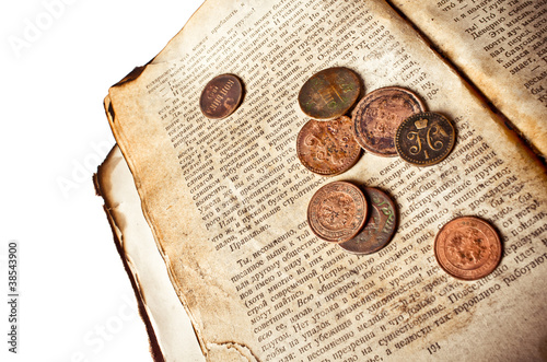 Vintage book with copper coins