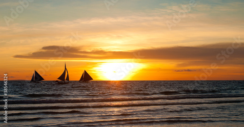 sailing at sunset