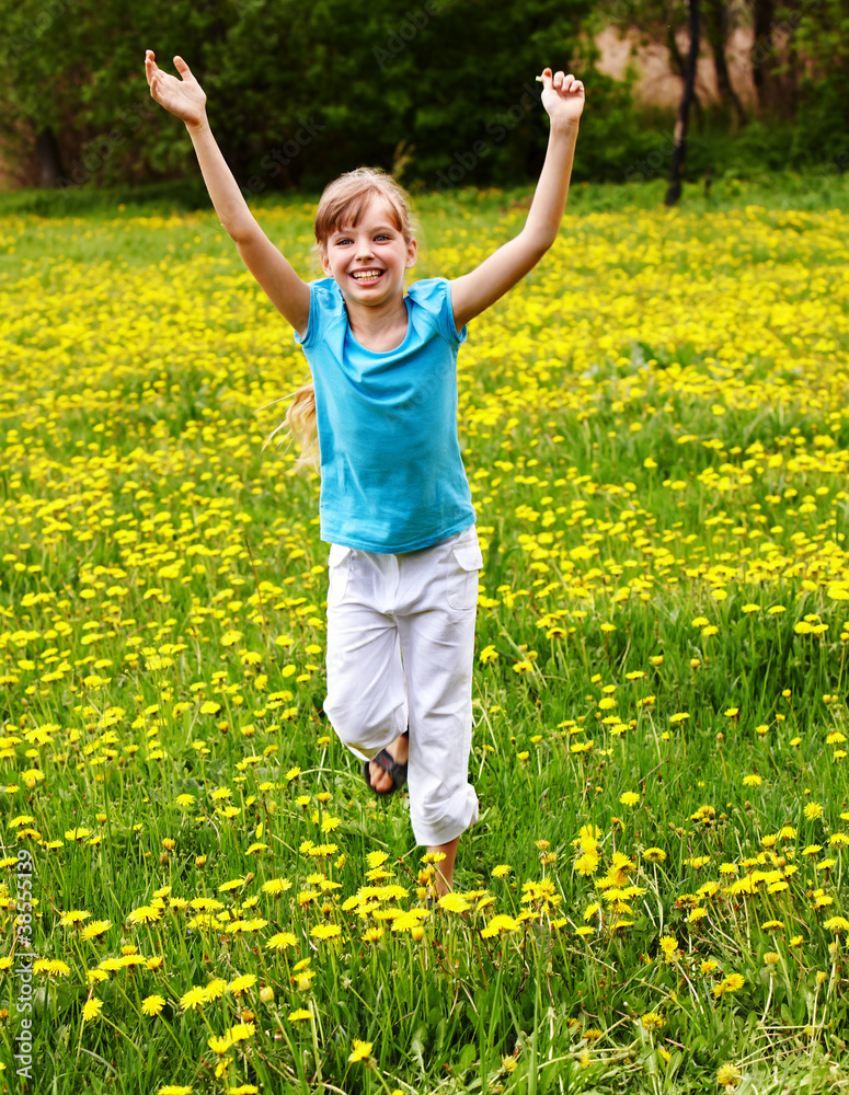 Happy child running in field. Happy child running in field.