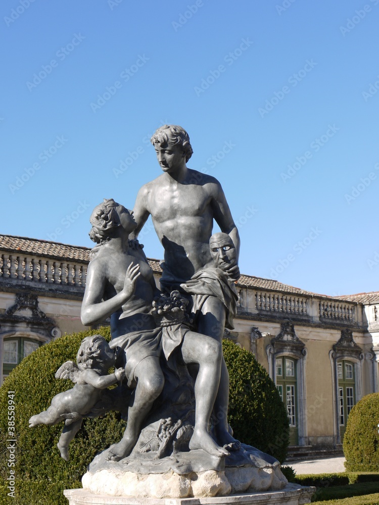 A bronze statue in the garden of the Queluz palace in Portugal