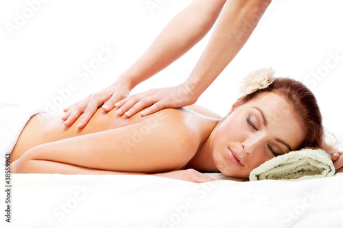 Young beautiful woman getting massage.