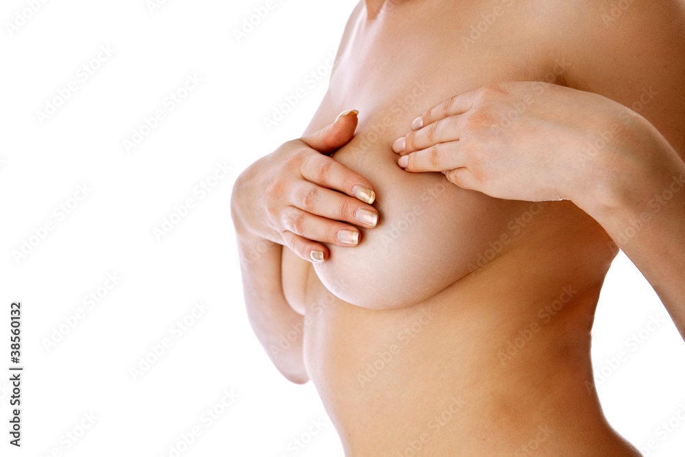 Woman holding her breast