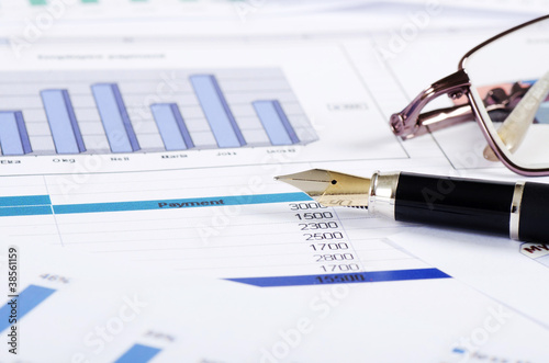 Graphs, charts, business table. The workplace of business people