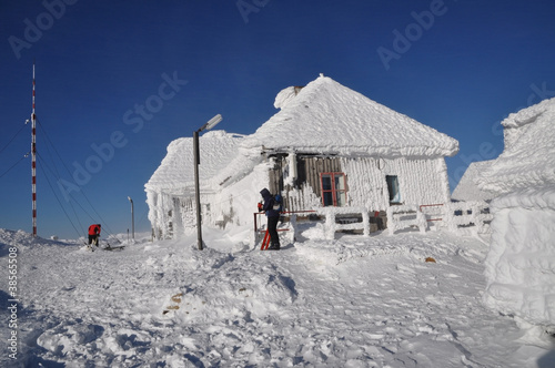 An ice-covered meteorological station, high on a mountain-top