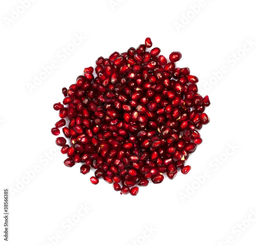 Extreme close up background of a red juicy ripe pomegranate frui