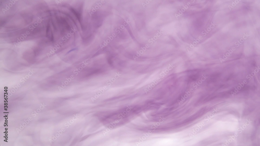 Magenta ink cloud in water swirling 